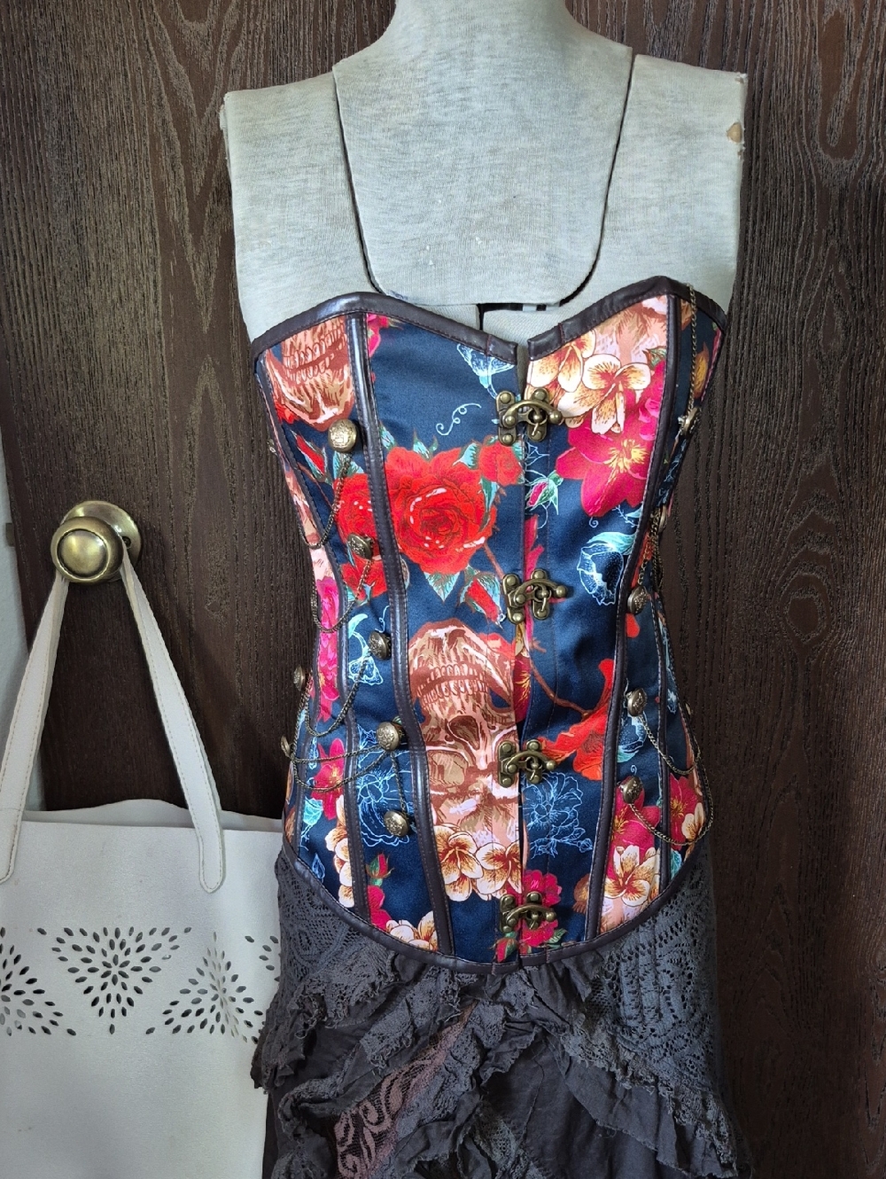 Multicolored corset featuring roses and skulls